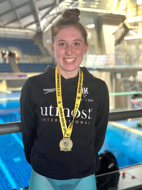 Ellie Johnson clinched a gold medal in the 16-and-over 200m breaststroke in a lifetime best of 3:03.08