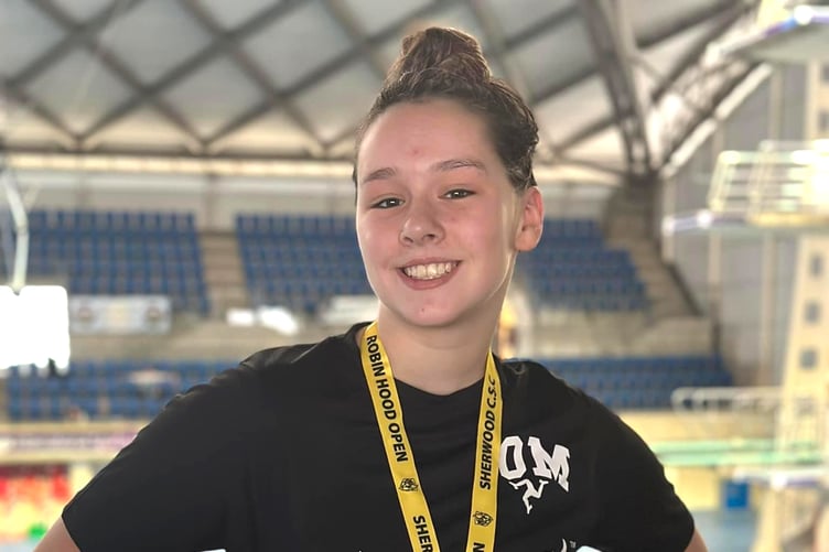 Kaya Reynolds stormed to gold in the age 15s 200m backstroke