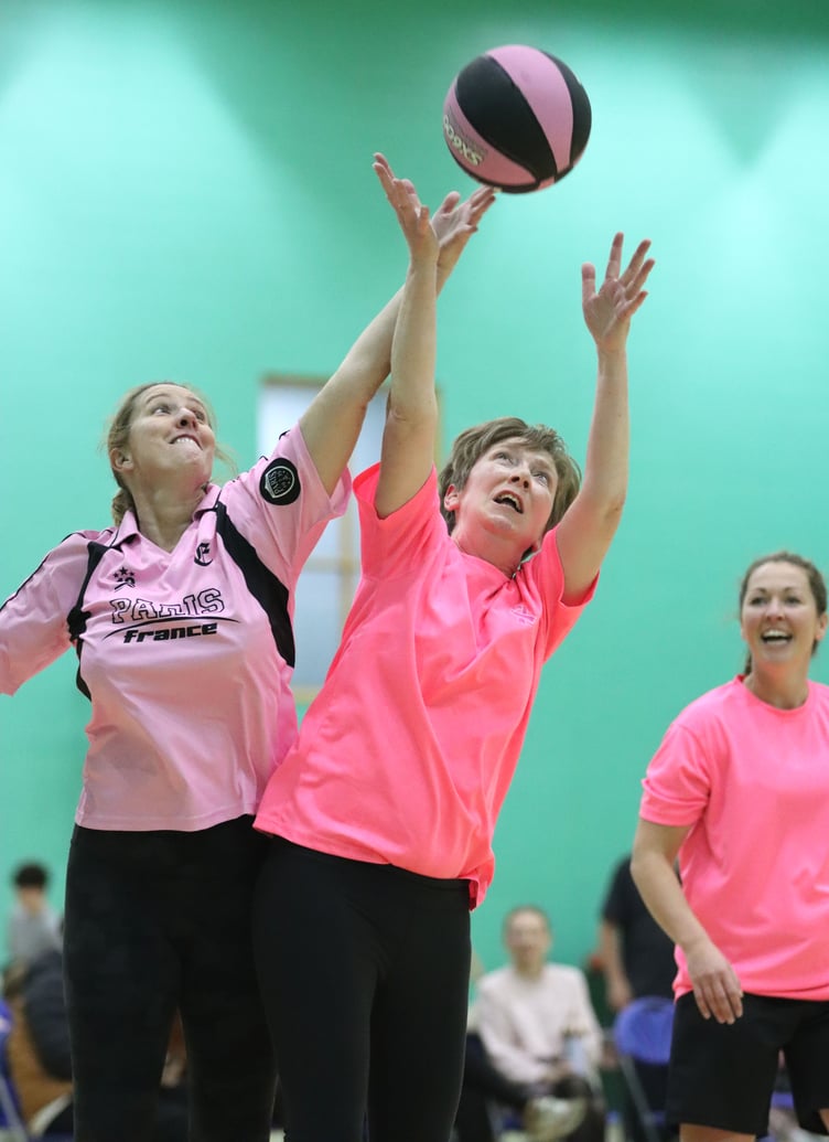 Trudi Halsall (left) and Lorna Kirkham fight for the rebound during the Big Pink 3x3 charity basketball tournament in aid of Manx Breast Cancer