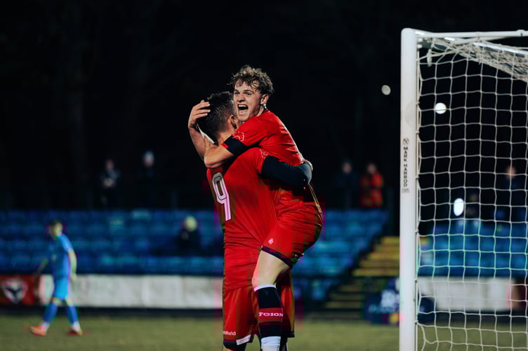 Dean Pinnington (right) celebrates with two-goal man Sean Doyle during Saturday's match at the Bowl (Photo: David Lovelady)