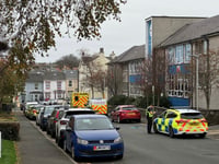 School children evacuated amid nearby armed police incident