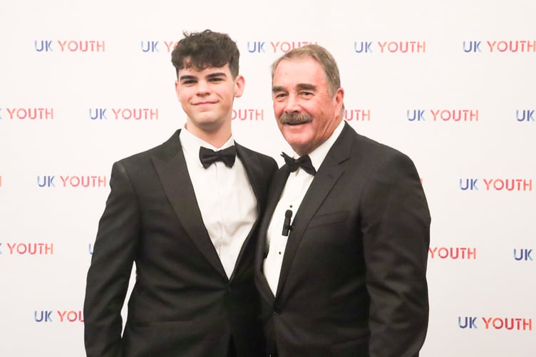 Isle of Man racer Nickolas Ellis with former Formula One world champion Nigel Mansell at UK Youth gala dinner in London recently