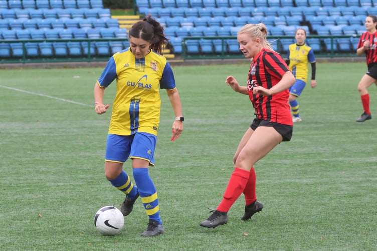 Onchan's Courtney Goldsmith (left) and Malew's Abi Sutterby in action during the opening round of fixtures in the 2024/25 Women’s Floodlit Cup competition (Photo: Paul Hatton)