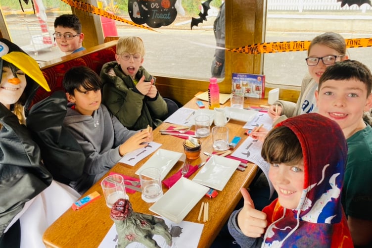 Children on board the Hop-Tu-Naa ghost train