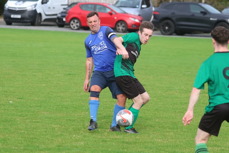 Michael United's Owen Hurt (right) in action recently against Martin King of DHSOB (Photo: Paul Hatton)