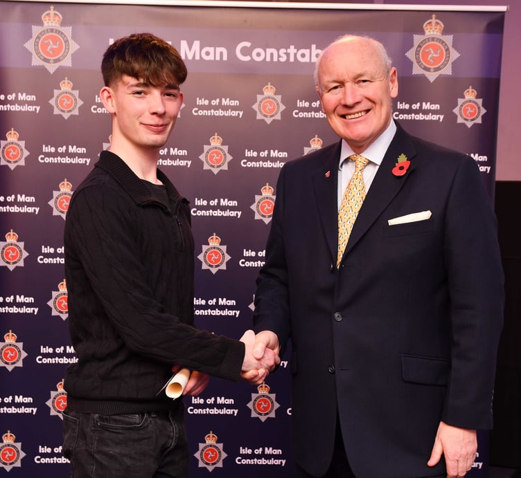 Ryan Coates receives a bravery award from Lieutenant Governor Sir John Lorimer at the Chief Constable’s Annual Awards