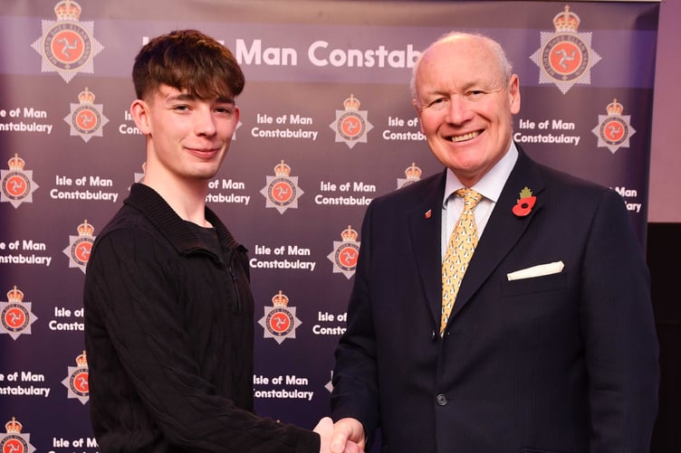 Ryan Coates receives a bravery award from Lieutenant Governor Sir John Lorimer at the Chief Constable’s Annual Awards
