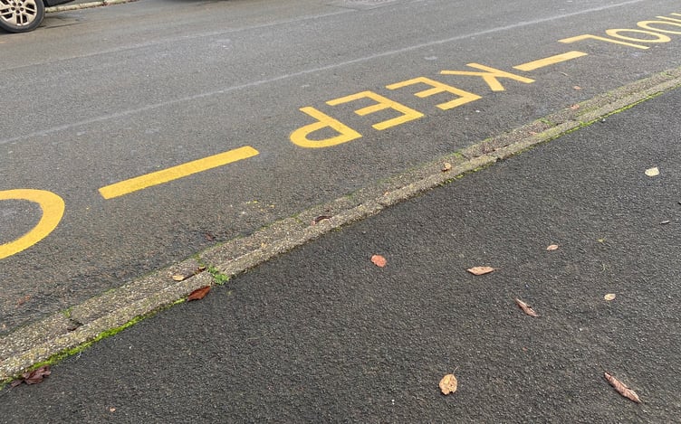 Road markings at a school in Douglas