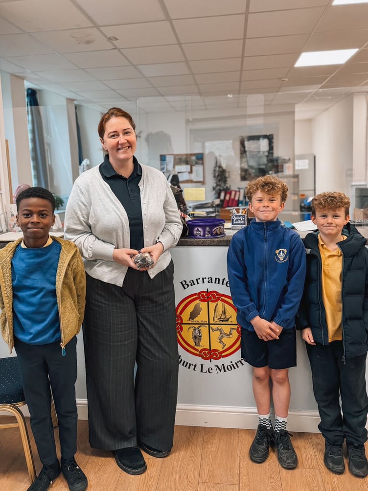 Scoill Phurt Le Moirrey pupils hand out treats to Port St Mary Commissioners