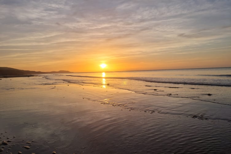 Alex Michaels snapped this shot of sunset at Glen Wyllin Beach
