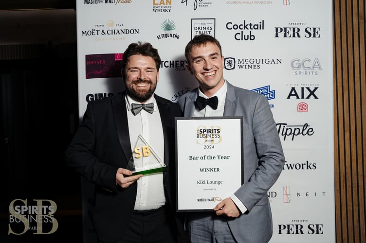 Jamie Lewis and Drew Fleming of KiKi Lounge with their Bar of the Year awards