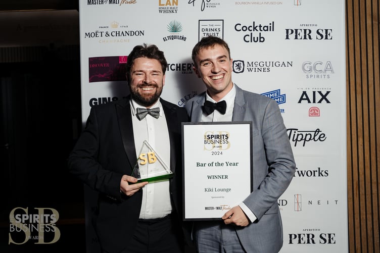 Jamie Lewis and Drew Fleming of KiKi Lounge with their Bar of the Year awards