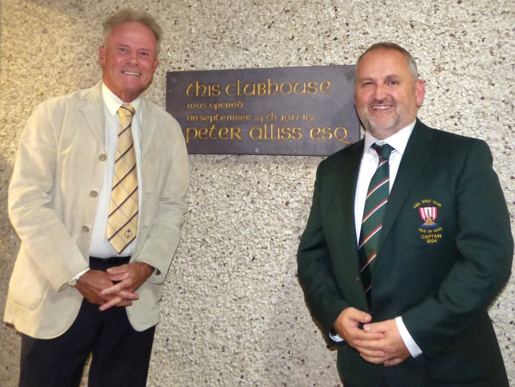 PGA master professional Gary Alliss - son of the 'Voice of Golf' Peter Alliss - pictured with Peel Golf Club captain Allan Bashforth at last week's men's dinner. They are stood in front of the plaque commemorating when Alliss Sr opened the westerners' clubhouse in 1977