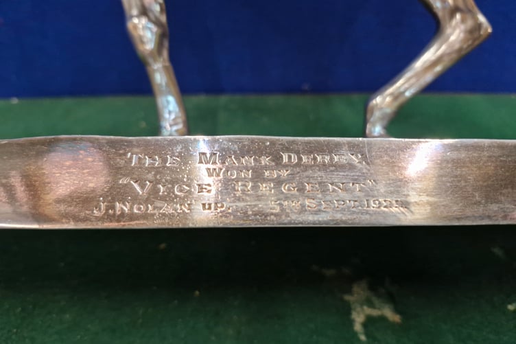 The engravement on the trophy.