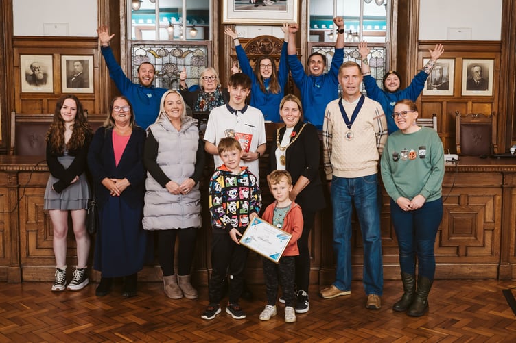Kian Morris with family, friends and Isle of Play colleagues