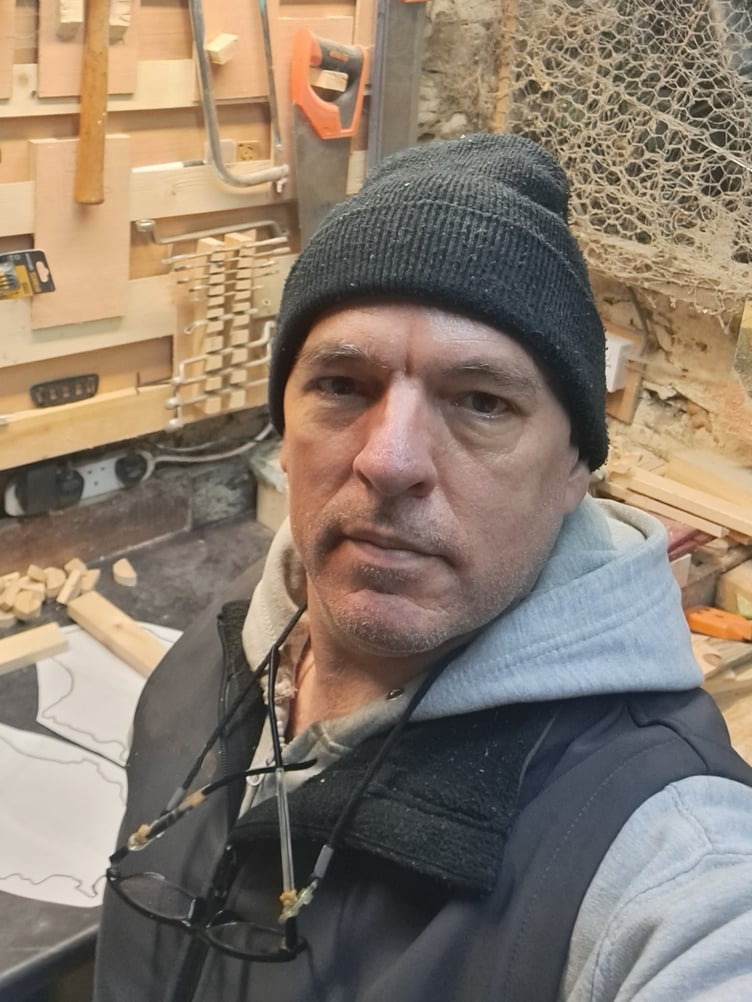 Rob New in his woodworking studio