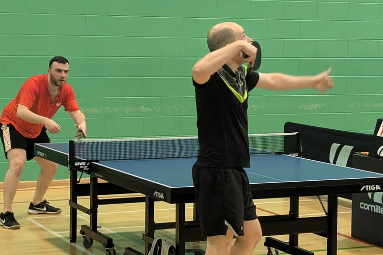 Scott Lewis lines up a serve against Duncan Alexander in what proved to be a classic final at the NSC (Photo: Ken Mitchell)