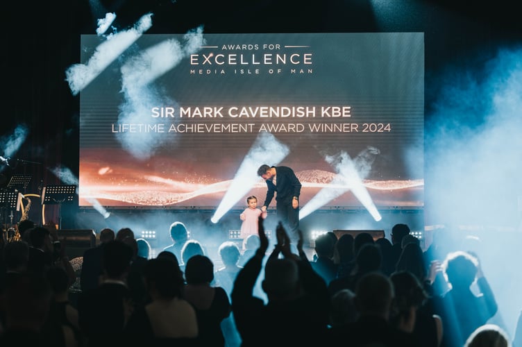 Sir Mark Cavendish KBE with his youngest daughter Astrid after collecting the Lifetime Achievement Award at the Media Isle of Man Awards for Excellence last Thursday