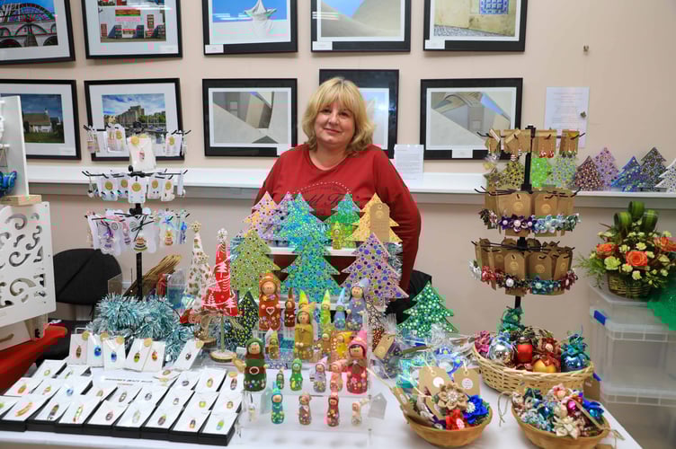Christine Collister with her jewellery and souvenir stall
