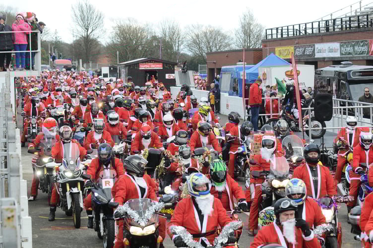 The annual Santa on a Bike charity parade sets off from the TT Grandstand in Douglas 
