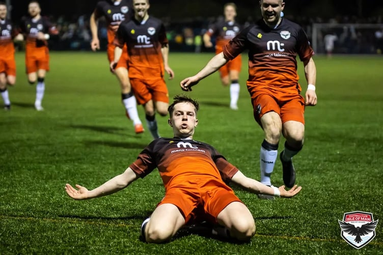 Jack Camarda celebrates the wonder goal he scored against Wythenshawe Amateurs to help the Manx side book a place in the North West Counties Football League Division South play-off final in 2022 (Photo: Gary Weightman)