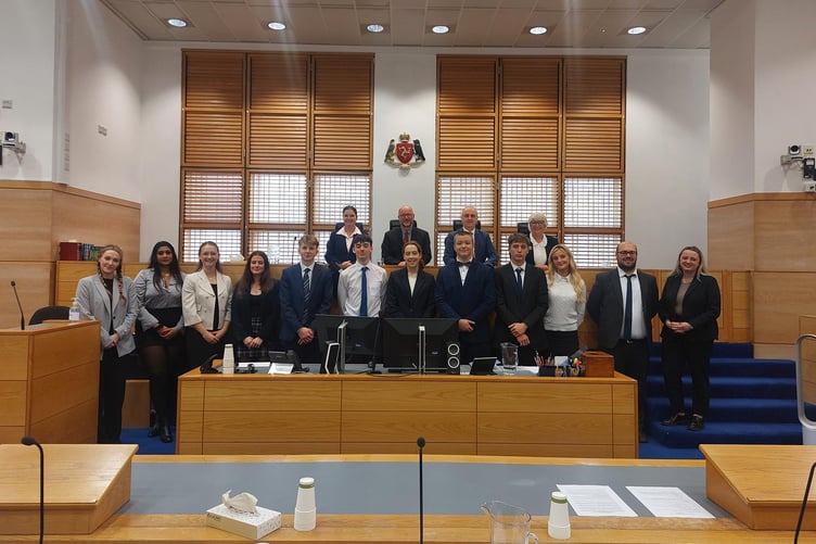 Members of the Island’s Magistery (back with ten students together with advocates Michael Miles and Helen Lobb (far right)