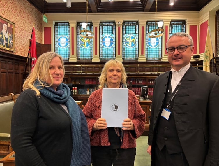 Rushen MHK and DoI Minister Dr Michelle Haywood MHK, petitioner Christa Viohl, and Rushen MHK Juan Watterson SHK