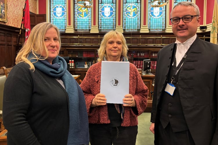 Rushen MHK and DoI Minister Dr Michelle Haywood MHK, petitioner Christa Viohl, and Rushen MHK Juan Watterson SHK