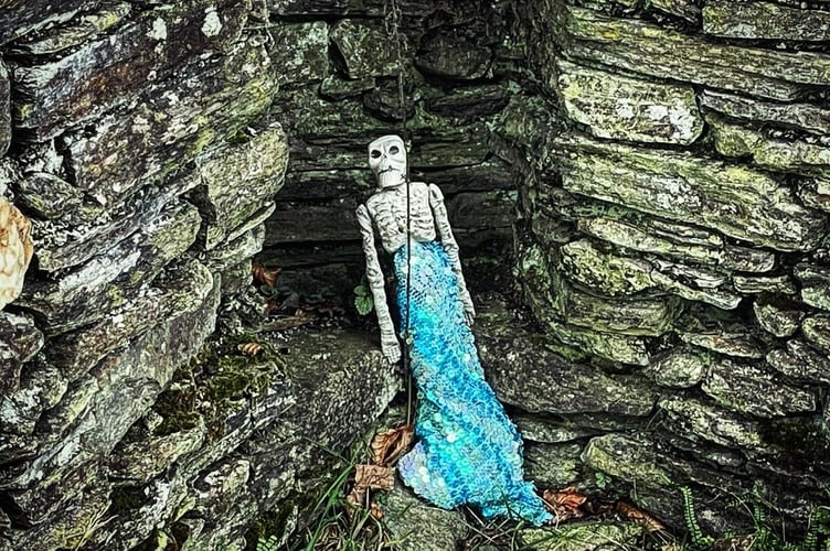 A doll-size toy skeleton left in the fireplace of Montpelier House by a prankster