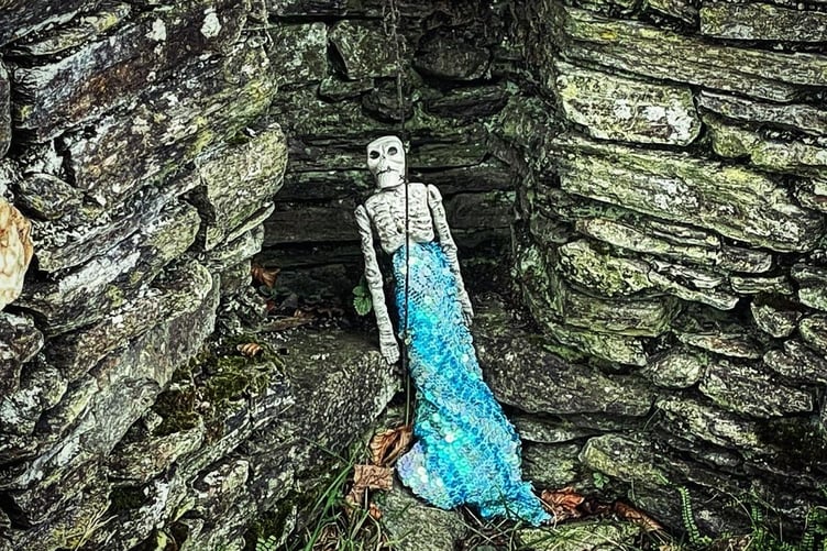A doll-size toy skeleton left in the fireplace of Montpelier House by a prankster