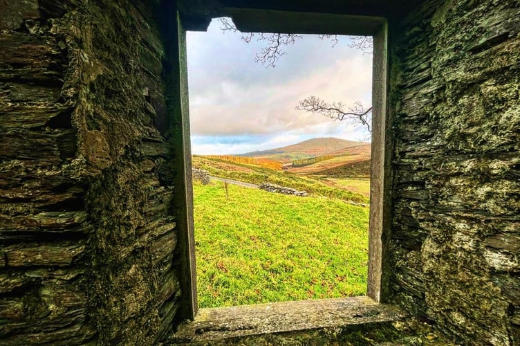 Snaefell visible through the glassless window of Montpelier House
