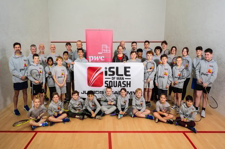 Isle of Man Squash has secured a junior sponsorship deal with PwC. Adult and junior players are pictured with PwC corporate responsibility leader Paul Jones (left of PwC banner), audit director Dasa Brynjolffssen (right of PwC banner) and squash coach Stephen Pitts (right of banner). A full report appeared in this week's Isle of Man Examiner.