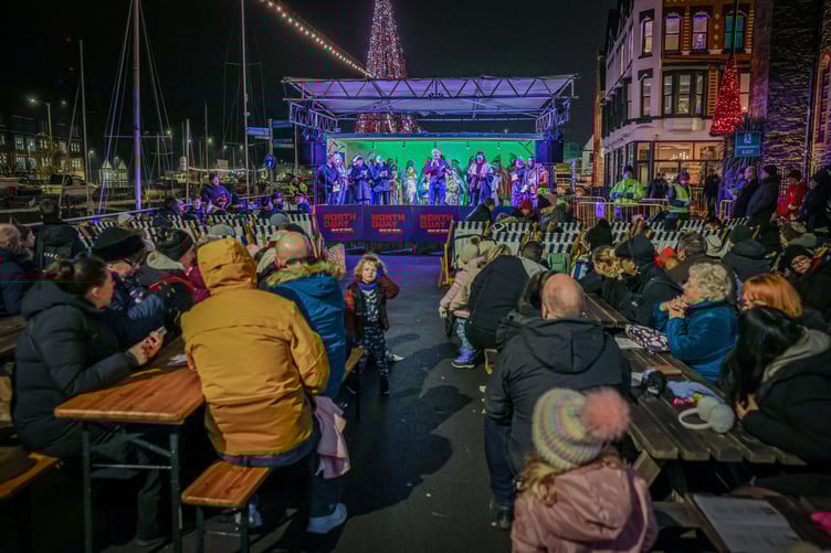 The Christmas Live crowd look on at the nativity scene on stage