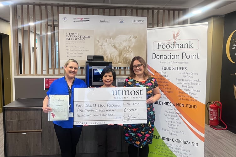 Left to right: Helen Crellin from Utmost, Marge Balbuena from the Foodbank and Cory Addy from Utmost