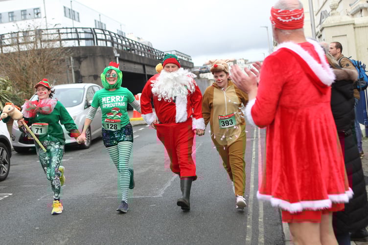 (Left to right) Bianca Cawkwell, Annie Eastham, John Ballard and Glesni Witt all got in the festive spirit for the Children's Centre (Photo: Dave Norton)