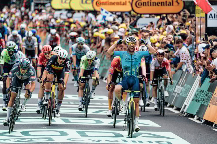 Mark Cavendish celebrates as he crosses the finish line to clinch a record-breaking 35th stage win at the Tour de France in July this year, breaking the record of 34 he shared with Belgian cycling legend Eddy Merckx (Photo: Zac Williams/SWpix.com)