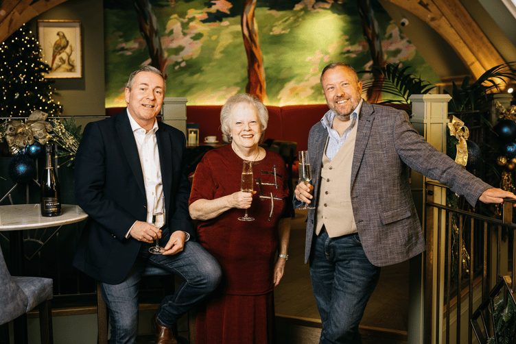 Harmony Homes' Paul McArd and Helen Ainsworth with Partners Co-Founder and Chairman Brendan Beeken