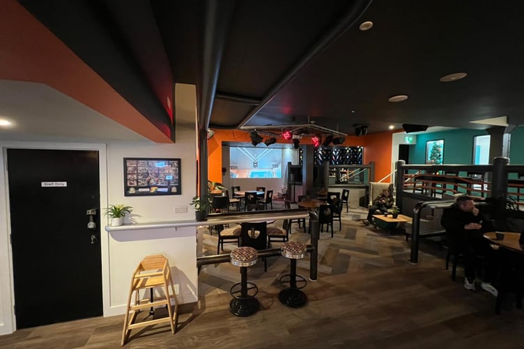 Inside the new Paramount City coffee and barber shop on Douglas Promenade