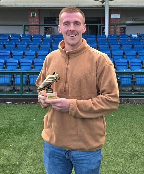 Ayre United defender Jamie Callister with the Canada Life Premier League Player of the Month award for November
