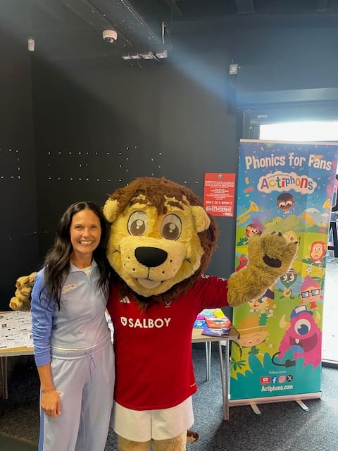 Kathryn Austerberry with Salford City’s 'Billy The Lion' mascot