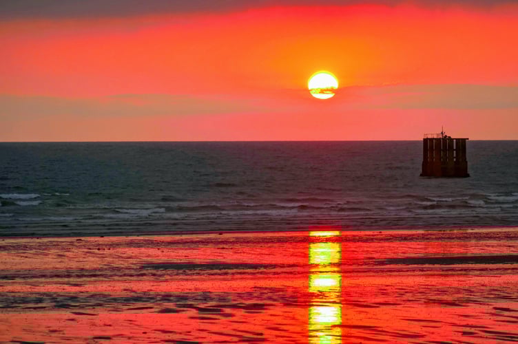 Morning sunrise over Ramsey bay by Mike Quine 