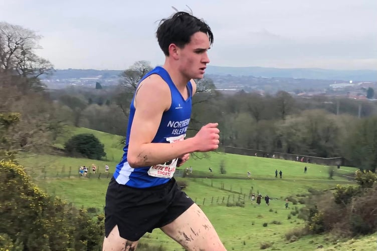 Northern AC’s Sam Perry produced a brilliant run to finish third overall and second in the u20 category during the 9.8km men’s race for u20, senior and veteran athletes, the final race of the day (Photo: Steve Partington)