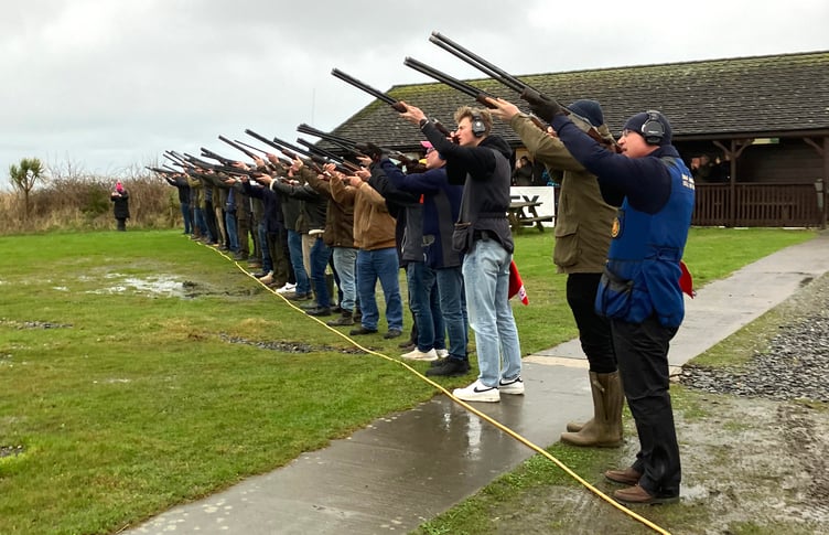 Isle of Man Clay Pigeon Shooting Club members hold a shotgun salute at Meary Veg in memory of Davey Clague who was a long-time member of the Santon club