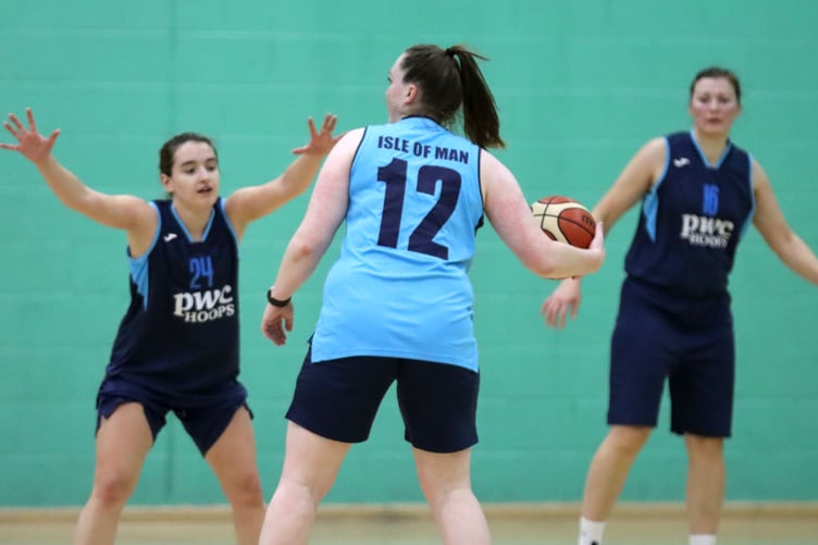 Holly Hennessy (left) defends against Zoe Kirkham in the open court women's game last week. Open women's sessions will be running 7-8pm every Thursday throughout January (Photo: Oliver Hamilton)