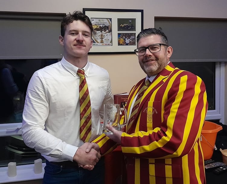 James Ross (left( picking up his man of the match award from club president Gareth Hooson-Owen after Saturday's game with Sandbach