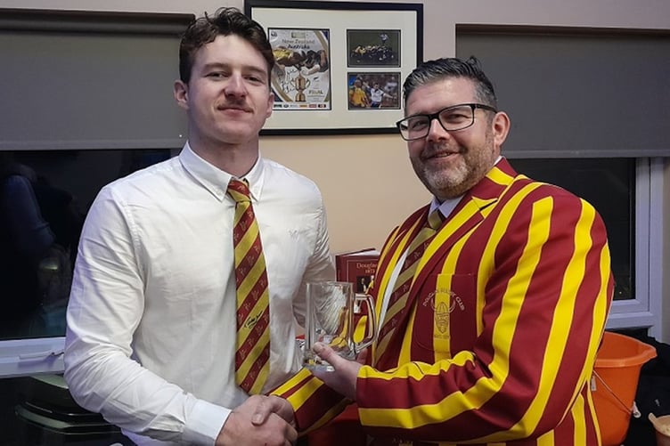 James Ross (left( picking up his man of the match award from club president Gareth Hooson-Owen after Saturday's game with Sandbach