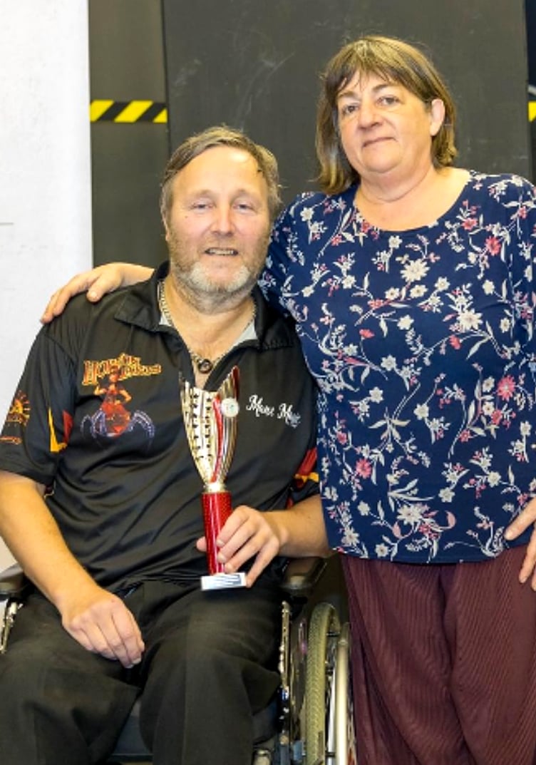 Isle of Man darter Darren Kennish with World Paradarts chairperson Sarah Smale after finishing second in the World Paradarts Target World Championships