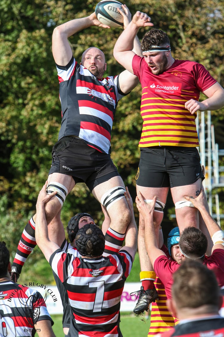Chris Weighill (left) secures lineout for Altrincham Kersal despite Harry Cartwright's jump (Photo: Richard Ebbutt)