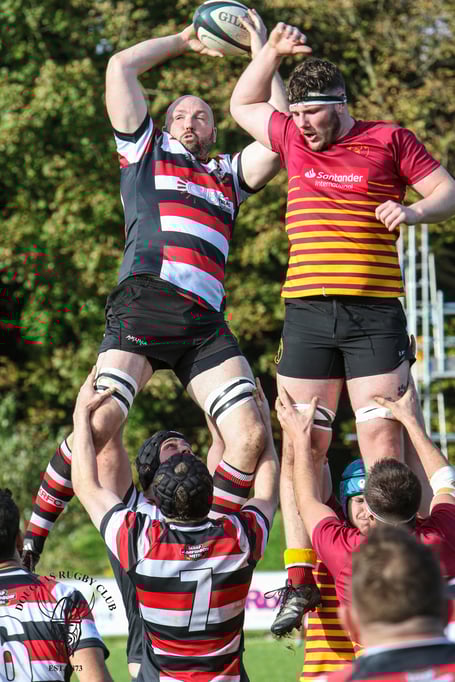 Chris Weighill (left) secures lineout for Altrincham Kersal despite Harry Cartwright's jump (Photo: Richard Ebbutt)