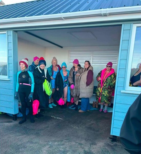 Members of the Northern Dipping Group test out the new shelter